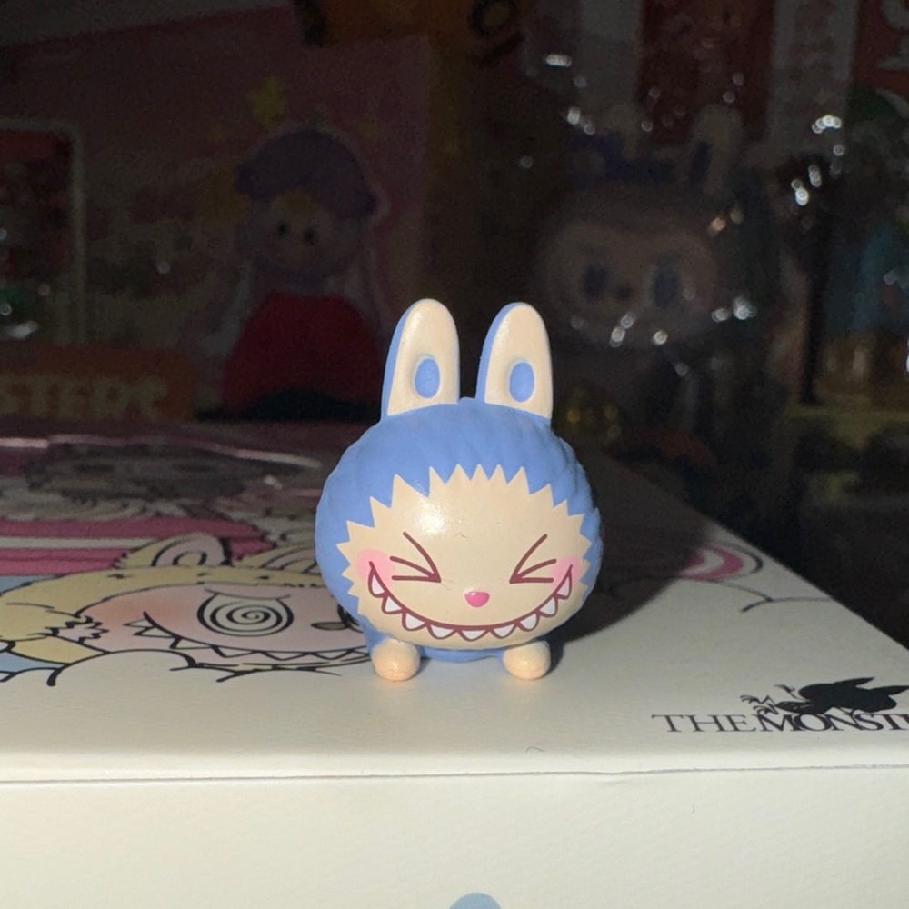 Purple labubu Popbean from the Laying Down series